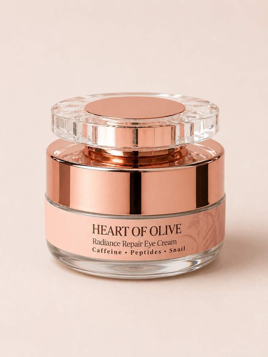 Heart of Olive Radiance Eye Cream in a sleek jar, designed for eye firming and rejuvenation, with a smooth, creamy texture.