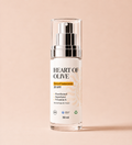 Heart of Olive tinted sunscreen SPF 35 tube with a beige shade, featuring a sleek design and a white cap.